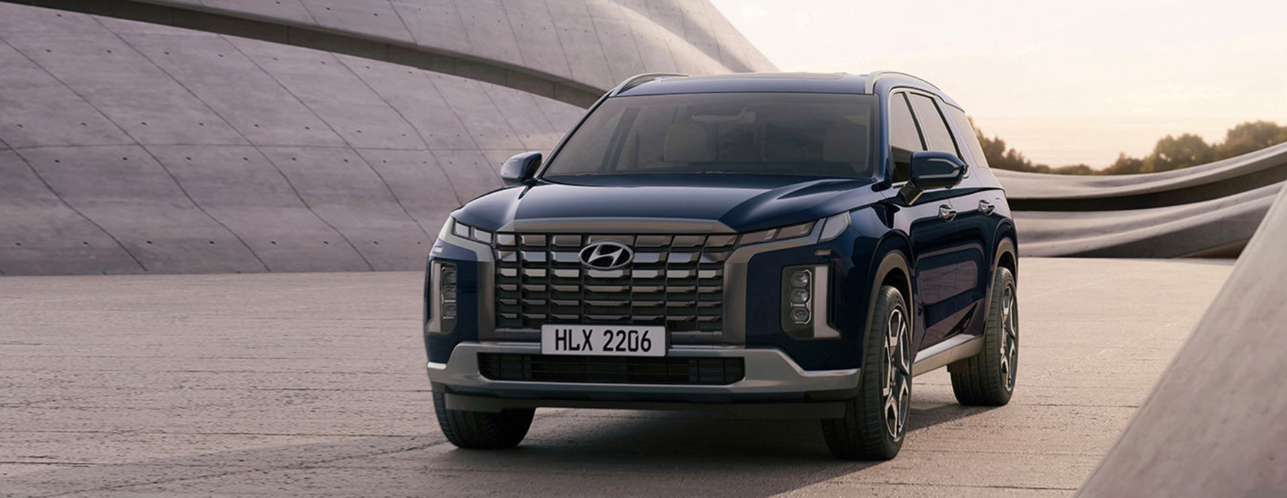 Closer view at the front part of Hyundai car with its logo and grille