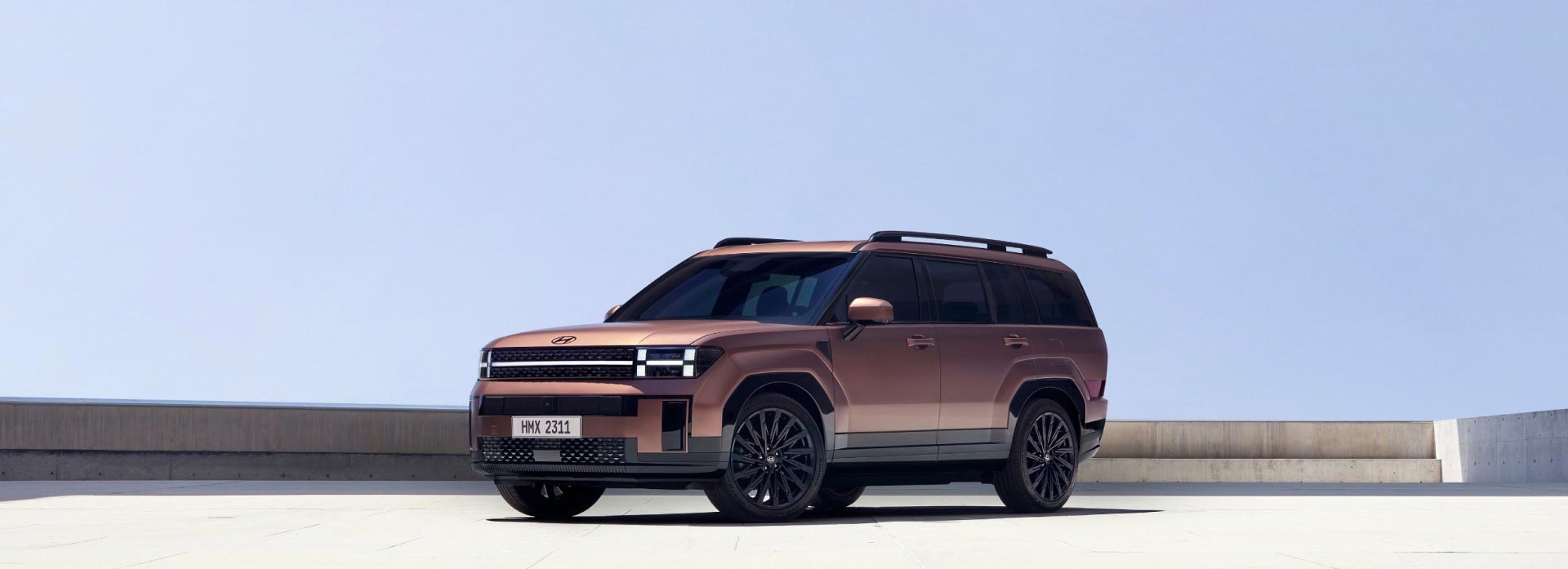 Closer view at the front part of Hyundai car with its logo and grille