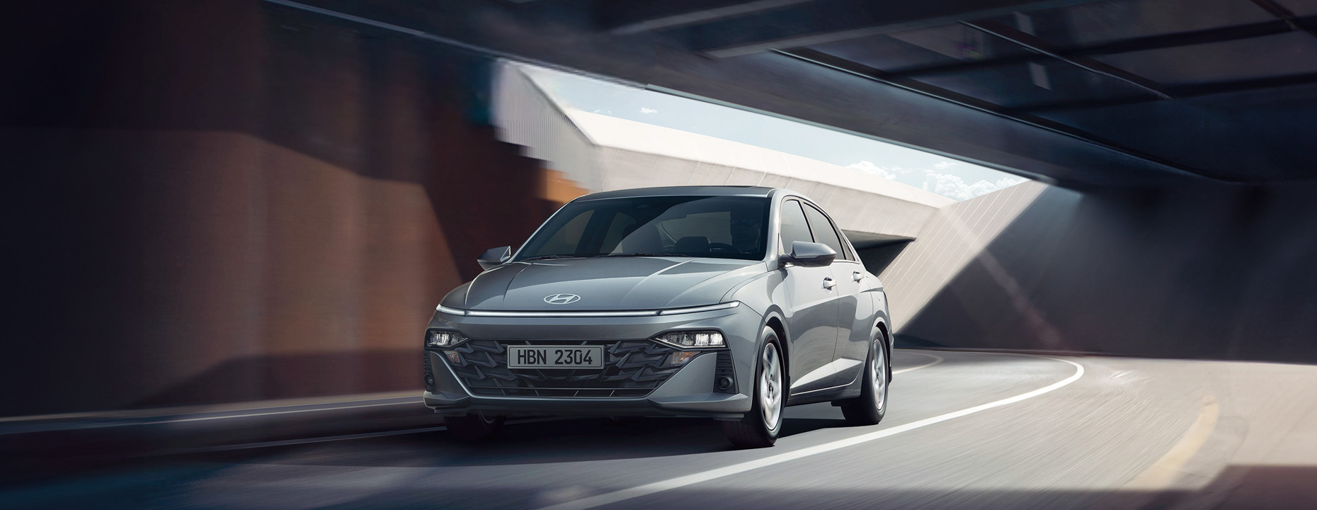 Closer view at the front part of Hyundai car with its logo and grille