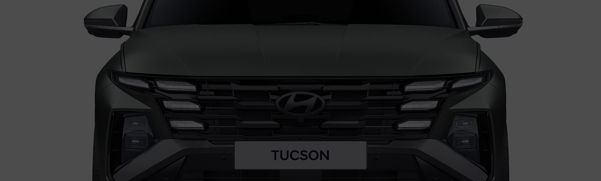 Closer view at the front part of Hyundai car with its logo and grille